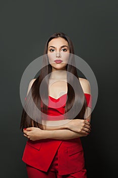 Fashion model woman with shiny hair on black background