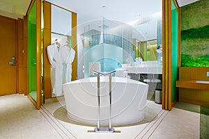 The fashion modern bathroom, including bathtub, shower, basins and toilet