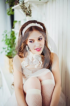 Fashion photo of smiling girl wearing wedding dress