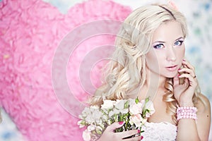 Fashion photo of a young woman with blond hair.