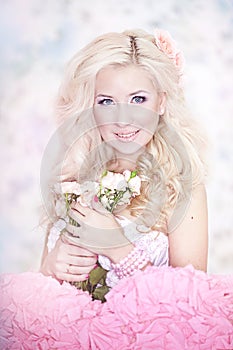 Fashion photo of a young woman with blond hair.