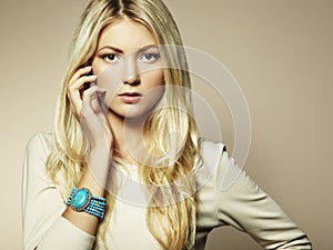 Fashion photo of a young woman with blond hair