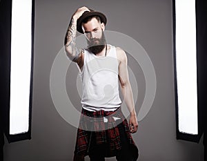 Fashion Photosession of Bearded Man in Hat