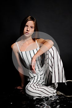 fashion picture of beautiful girl wearing black and white clothing