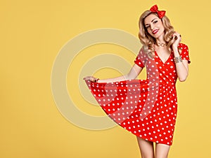 Fashion PinUp Girl in Red Polka Dots Dress.Vintage