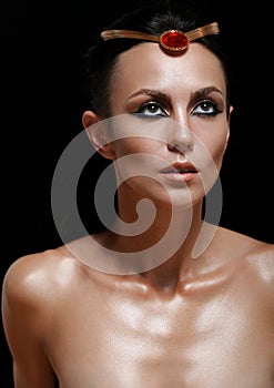Fashion portrait of attractive glamourous woman on black backgro