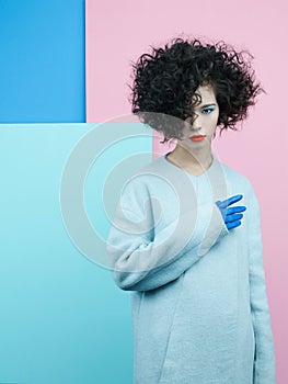 Fashion portrait of beautiful asian woman in sky-blue coat