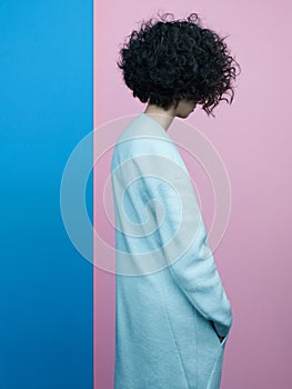 Fashion portrait of beautiful asian woman in sky-blue coat