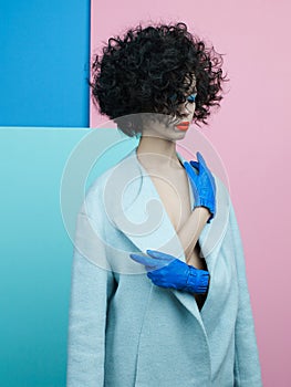 Fashion portrait of beautiful asian woman in sky-blue coat