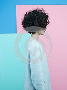 Fashion portrait of beautiful asian woman in sky-blue coat