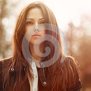 Fashion portrait of a beautiful young woman face - closeup