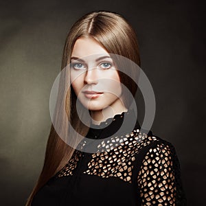 Fashion portrait of elegant woman with magnificent hair