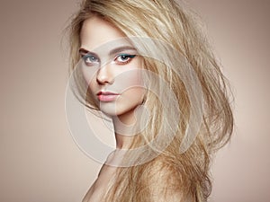 Fashion portrait of elegant woman with magnificent hair