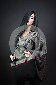 Fashion portrait of elegant woman in woll