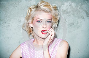 Fashion portrait of glamour sensual young stylish lady. Sensual blonde female model with red lips and bright make up