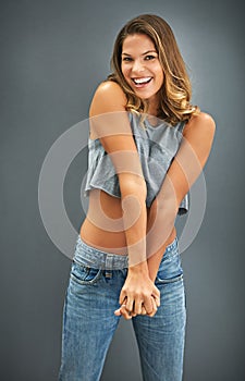 Fashion, portrait and happy woman in studio with carefree, positive attitude and fun denim clothes in USA. Smile, jeans