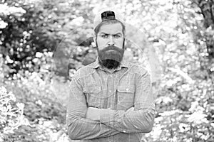 Fashion portrait of man. Hair beard care. guy in forest. summer camping. serious bearded man. Mature hipster with beard