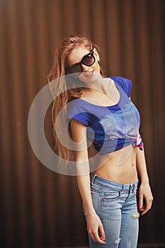 Fashion portrait of pretty young hipster blonde woman