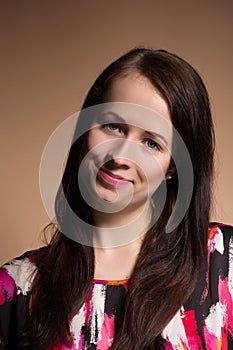 Fashion portrait of smiling beautiful young girl