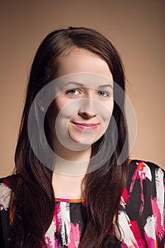 Fashion portrait of smiling beautiful young girl