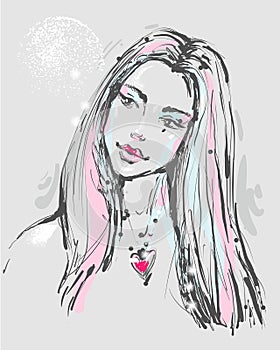 Fashion portrait of a young atractive woman with heart necklace