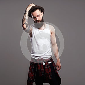 Fashion Portrait of young bearded man