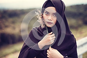 Fashion portrait of young beautiful muslim woman