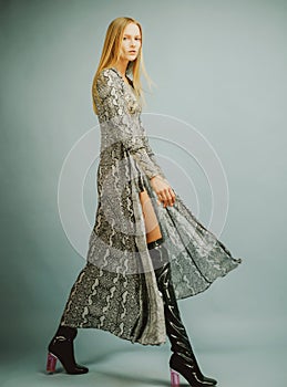 Fashion portrait of young stylish woman wearing trendy outfit. Young elegant woman in trendy dress. Fashion summer