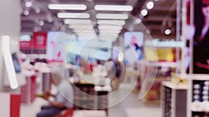 Fashion, retail and shop, blurred interior view of footwear shoe store in luxury shopping mall as defocused background