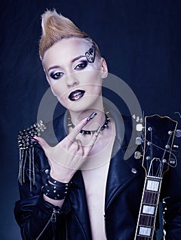 Fashion Rocker Style Model Girl Portrait. Hairstyle. Punk Woman Makeup, Hairdo and black Nails. Smoky Eyes