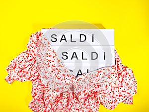 Fashion sale concept with lightbox text in Italian on yellow