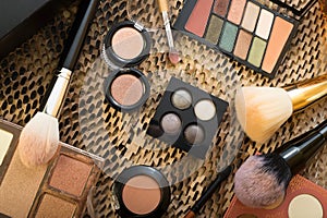 Fashion set of new cosmetics palettes with brushes. close up