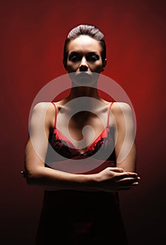 Fashion shoot of a young woman in a red dress