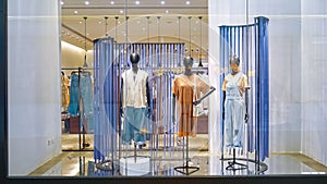 Fashion shop window  front dress store showcase