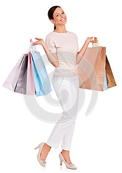 Fashion, shopping bag and portrait of woman on a white background for sale, discount and deal. Excited, happy customer