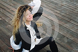 Fashion smiling model portrait dressed in black leather jacket