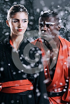 Fashion, snow and man with woman, Asian and stylish clothes with winter weather and traditional outfit. People, karate