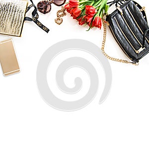 Fashion still life with accessories, flowers, phone