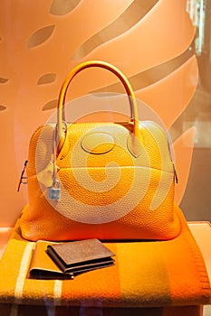 Fashion store handbag window display photo