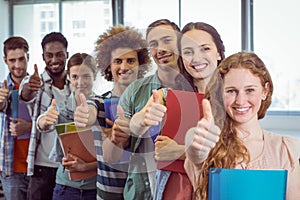 Fashion students smiling at camera together