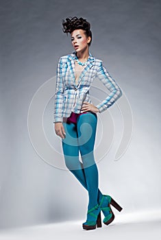 Fashion style - beauty woman in leggings posing