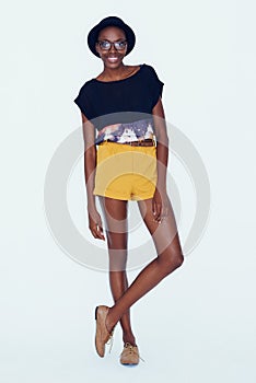 Fashion, style and portrait of black woman on a white background in trendy, stylish and casual clothes. Confidence