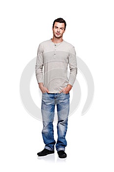 Fashion, style and portrait of man on a white background posing in trendy, stylish and modern clothes. 2000s style