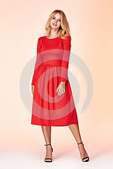 Fashion style woman perfect body shape blond hair wear red skinny short dress elegance casual beautiful model secretary