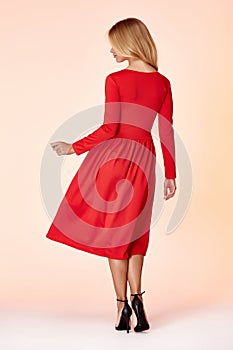 Fashion style woman perfect body shape blond hair wear red skinny short dress elegance casual beautiful model secretary