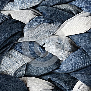 Fashion stylish textured fabric background of many plaits and br