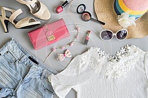 Fashion summer women clothes set with cosmetics and accessories photo