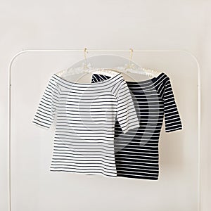 Fashion trend stripes. White and blue striped tops.