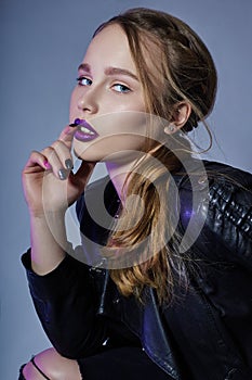 Fashion Vogue girl makeup purple lipstick, woman in leather jack