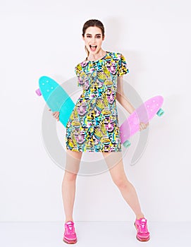 Fashion vogue model in colorful dress with